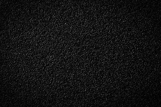 Black plastic background. Close up, high resolution photograph.