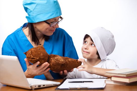 mom and son doctor treated the old teddy bear