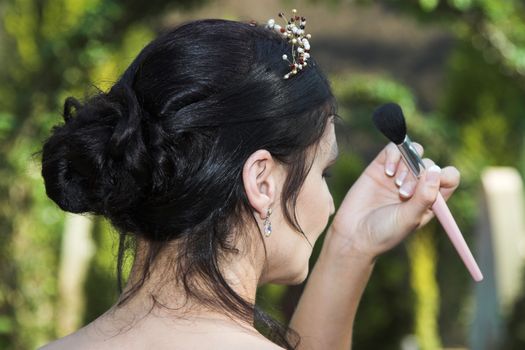 Beautiful Brunette bride with a beaded tiara