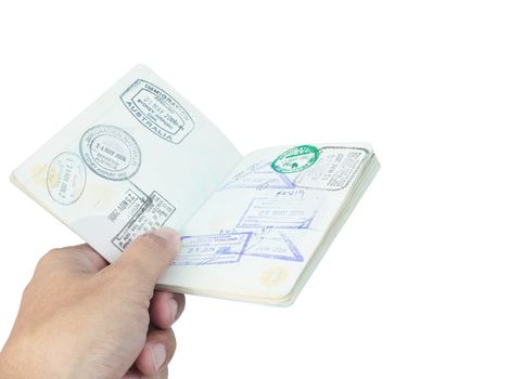 Passport stamp and hand on white background