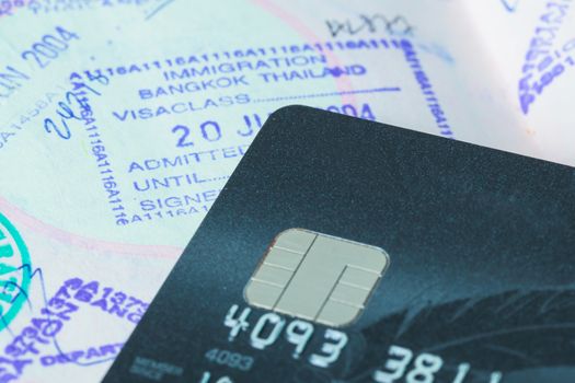 credit cards with sim and passport stamp for travel concept background