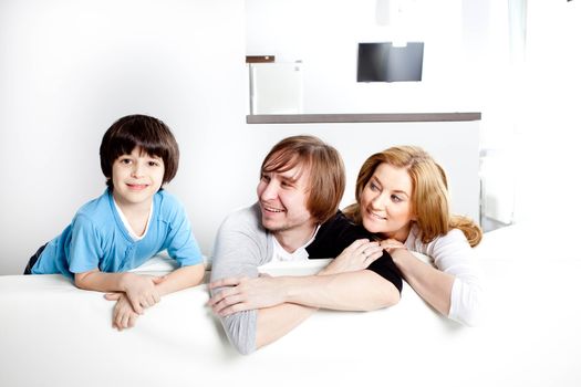 happy family in the interior of a new home