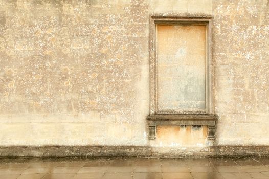 decaying wall and masonry frame architecture with large  text area