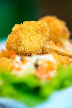 Sugar cane skewered fried minced shrimps or Chao tom - Vietnamese food