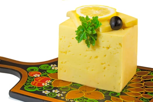Piece of the yellow porous cheese, the cut slices of cheese, lemon and olives. Are presented on a white background.