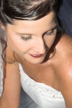 Beautiful brunette bride with hazel eyes, close up