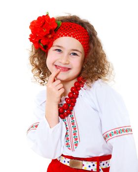 A little girl in Ukrainian national dress on the white background