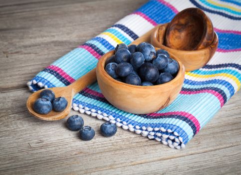 Fresh Blueberries on wooden Background