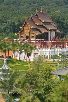 Traditional thai architecture in the Lanna style , Royal Pavilion (Ho Kum Luang) at Royal Flora Expo, Chiang Mai, Thailand