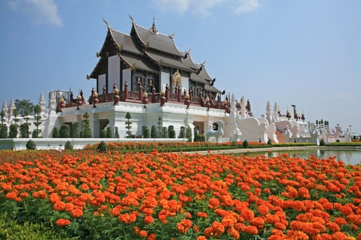 Traditional thai architecture in the Lanna style , Royal Pavilion (Ho Kum Luang) at Royal Flora Expo, Chiang Mai, Thailand