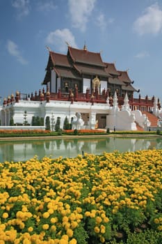 Traditional thai architecture in the Lanna style , Royal Pavilion (Ho Kum Luang) at Royal Flora Expo, Chiang Mai, Thailand