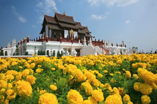 Traditional thai architecture in the Lanna style , Royal Pavilion (Ho Kum Luang) at Royal Flora Expo, Chiang Mai, Thailand