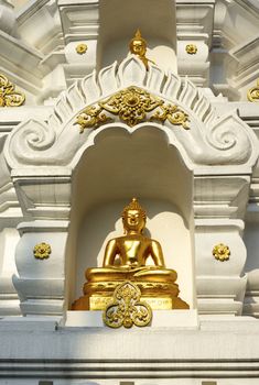 golden buddha at top of pagoda,Chiang rai temple,Thailand