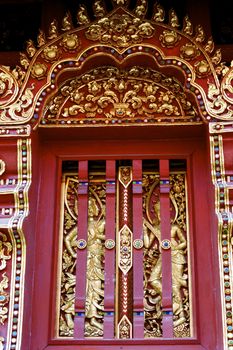 stucco work in thai art that usually decorated with mirror and precious stone or gold leaf,Chiang rai temple,Thailand