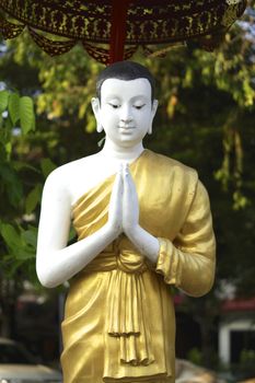 sculpture of monk in buddhist,shallow focus