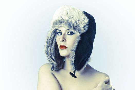 Sexy young with Russian hat on white background