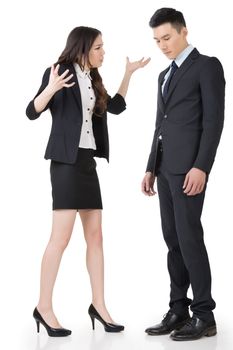 Angry business woman yelling to a man, full length portrait isolated on white background.