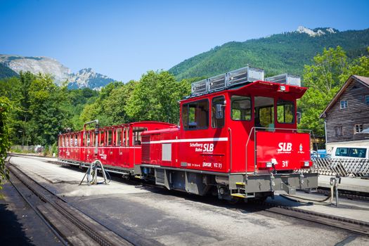 ST. WOLFGANG, AUSTRIA - AUGUST 6: Diesel locomotive of a vintage cogwheel railway going to Schafberg Peak (1783m) on August 6, 2013 in St. Wolfgang.