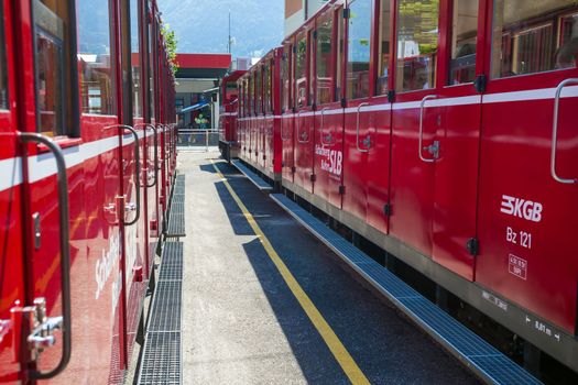 ST. WOLFGANG, AUSTRIA - AUGUST 6: Red tourist railway wagons on St. Wolfgang station prepared to go on Schafberg Peak (1783m) on August 6, 2013 in St. Wolfgang.