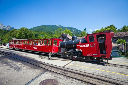 ST. WOLFGANG, AUSTRIA - AUGUST 6: Steam locomotive of a vintage cogwheel railway going to Schafberg Peak (1783m) on August 6, 2013 in St. Wolfgang.