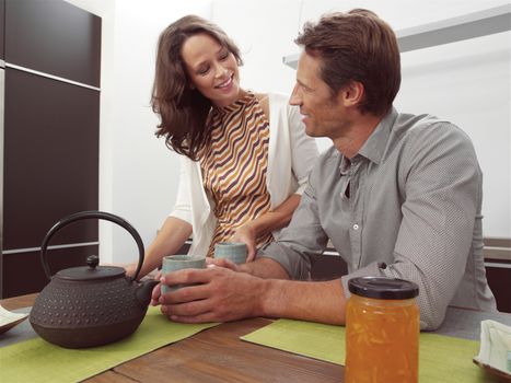 Attractive young couple in the kitchen