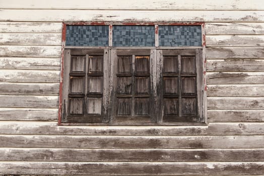 the old wood window and wall house