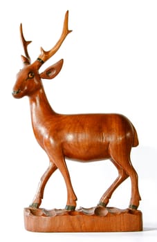 the Carved wooden deer with white background