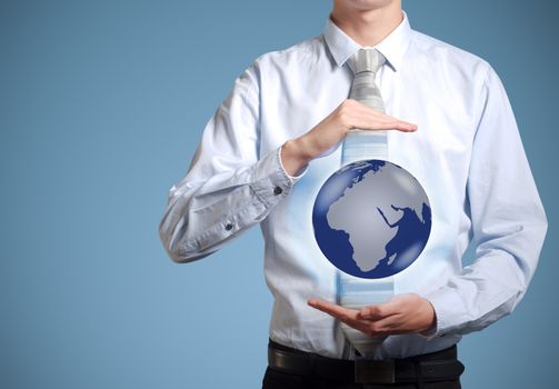 Businessman holds or holding world earth in the palm of hand