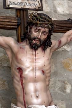 Figure of Jesus on the cross carved in wood by the sculptor Jose Miguel Tirao Carpio, Cristo de las Lluvias, Mengibar, Jaen province, Spain