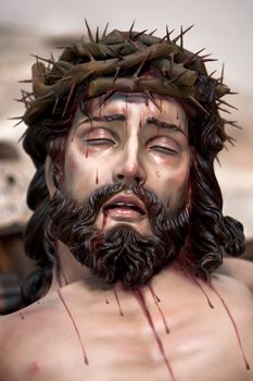 Figure of Jesus on the cross carved in wood by the sculptor Jose Miguel Tirao Carpio, Cristo de las Lluvias, Mengibar, Jaen province, Spain