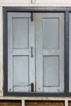 old windows at The wall of old house