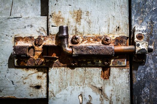 old bolt of the door with the rust