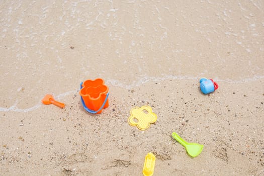 toys for childrens sandboxes against the sea and the beach