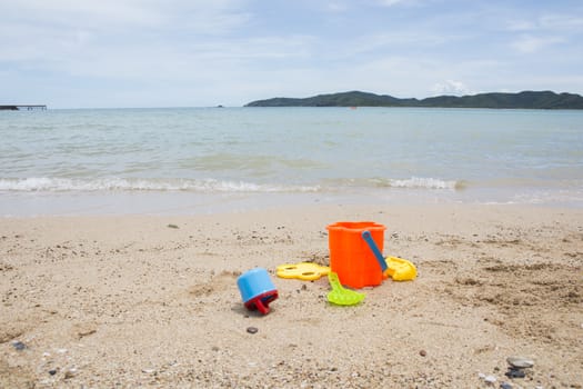 toys for childrens sandboxes against the sea and the beach