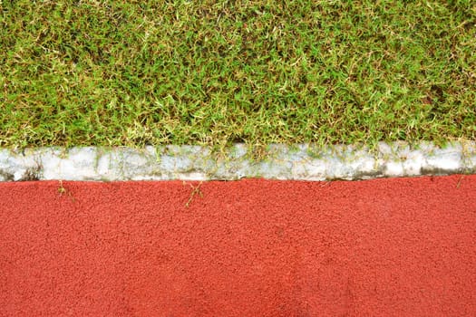 Running Tack and grass field After the Rain