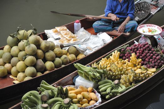 fruits in traditional floating market , Thailand.