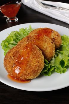 Chicken cutlet breaded in lettuce leaves