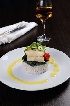 Flounder fillets (steamed) with risotto and spinach