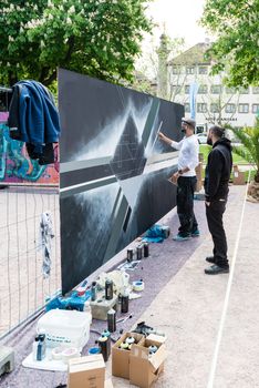 STUTTGART, GERMANY - APRIL 26, 2014: During the 21st International Trickfilm Festival artists have the chance to create graffiti artworks in the Game Zone located on the Schlossplatz (castle square) in the city center on April, 26,2014 in Stuttgart, Germany.