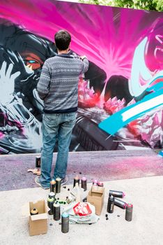 STUTTGART, GERMANY - APRIL 26, 2014: During the 21st International Trickfilm Festival artists have the chance to create graffiti artworks in the Game Zone located on the Schlossplatz (castle square) in the city center on April, 26,2014 in Stuttgart, Germany.