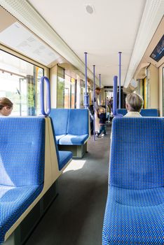 STUTTGART, GERMANY - APRIL 26, 2014: The U13 tram is transporting people from Ostfildern into the city center on April, 26,2014 in Stuttgart, Germany. Due to its typical location within a valley, not offering many routes out of the city, public transport is very important for Stuttgart and its surrounding villages.