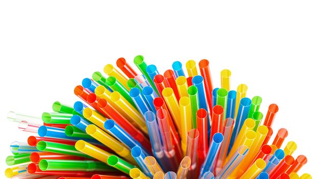 Colored Plastic Drinking Straws with copy-space on a white background