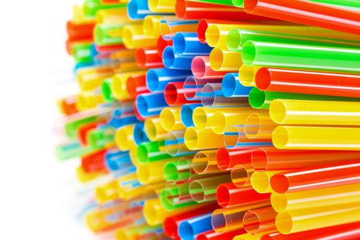 Colored Plastic Drinking Straws on a white background