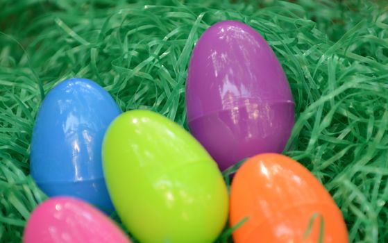 colorful easter eggs in green grass