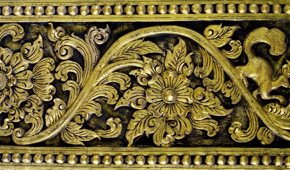 stucco work in thai art that usually decorated with mirror and precious stone or gold leaf,Chiang rai temple,Thailand