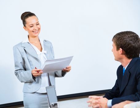 image of a discusses business woman with colleagues