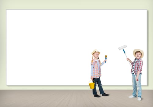 image of a children stand near a white blank wall, space for text