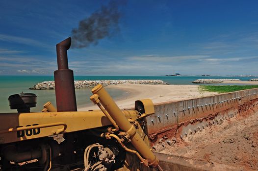 repairing road and sea breaker in beach near ocean