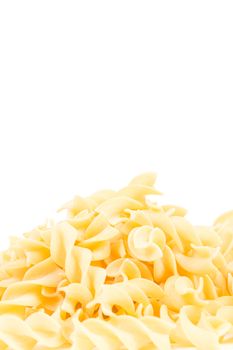 Three fusilli dry pasta isolated on white background