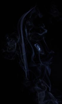 Abstract colored smoke closeup shot as the backdrop for the holidays